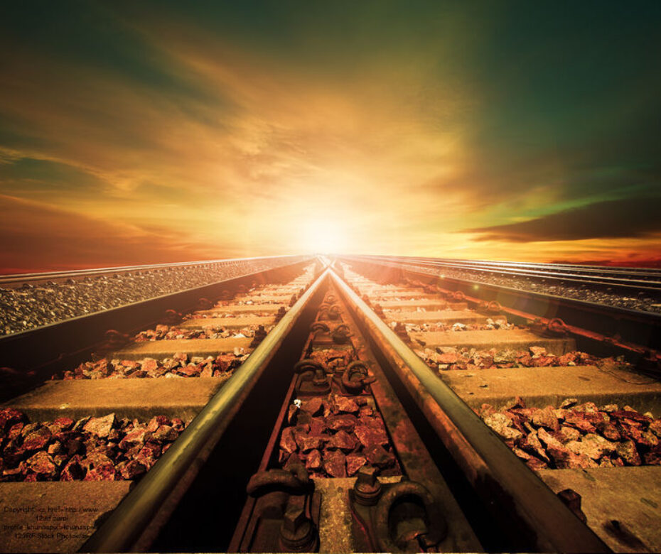 40565211 - junction of railways track in trains station agains beautiful light of sun set sky use for land transport and logistic industry background ,backdrop,copy space theme