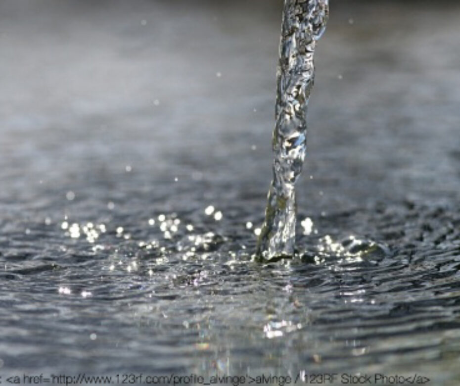 11910666 - highly detailed fresh and clear water beam pouring down into water surface.