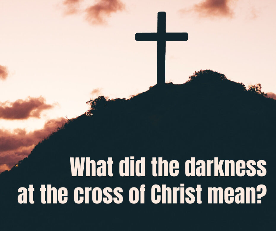 What did the darkness at the cross of Christ mean