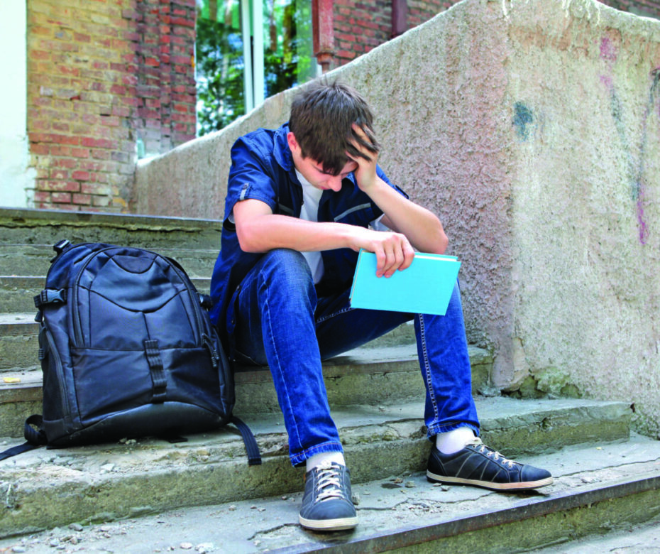 Sad Student With The Book